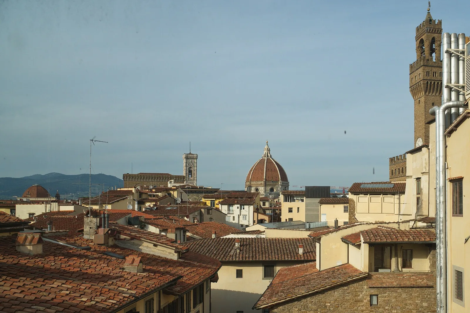 Florence Cathedral and the historic city rooftops in Florence, Italy