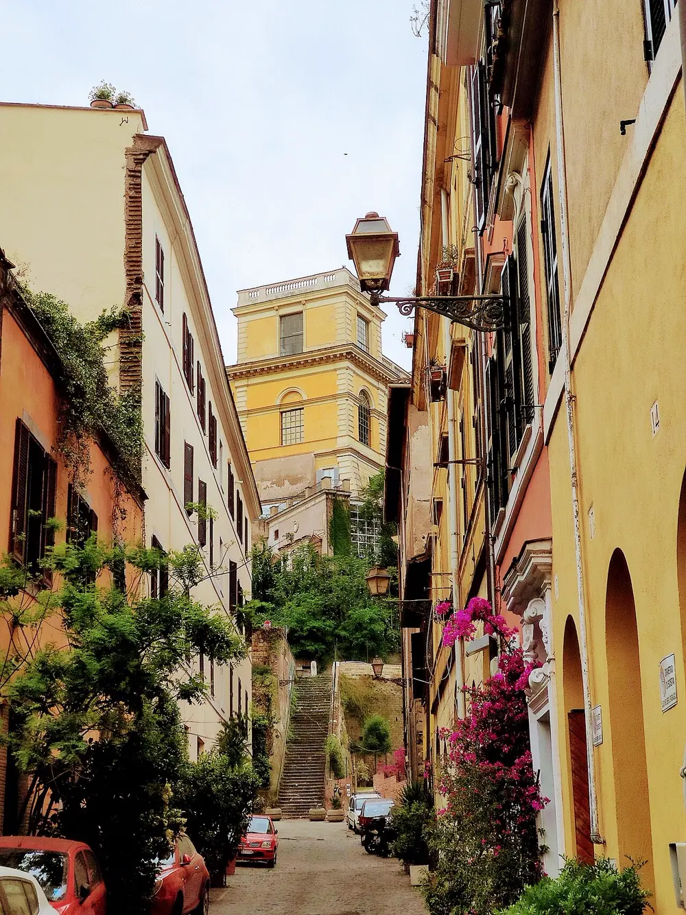 A quiet residential street in the Trastevere neighborhood of Rome