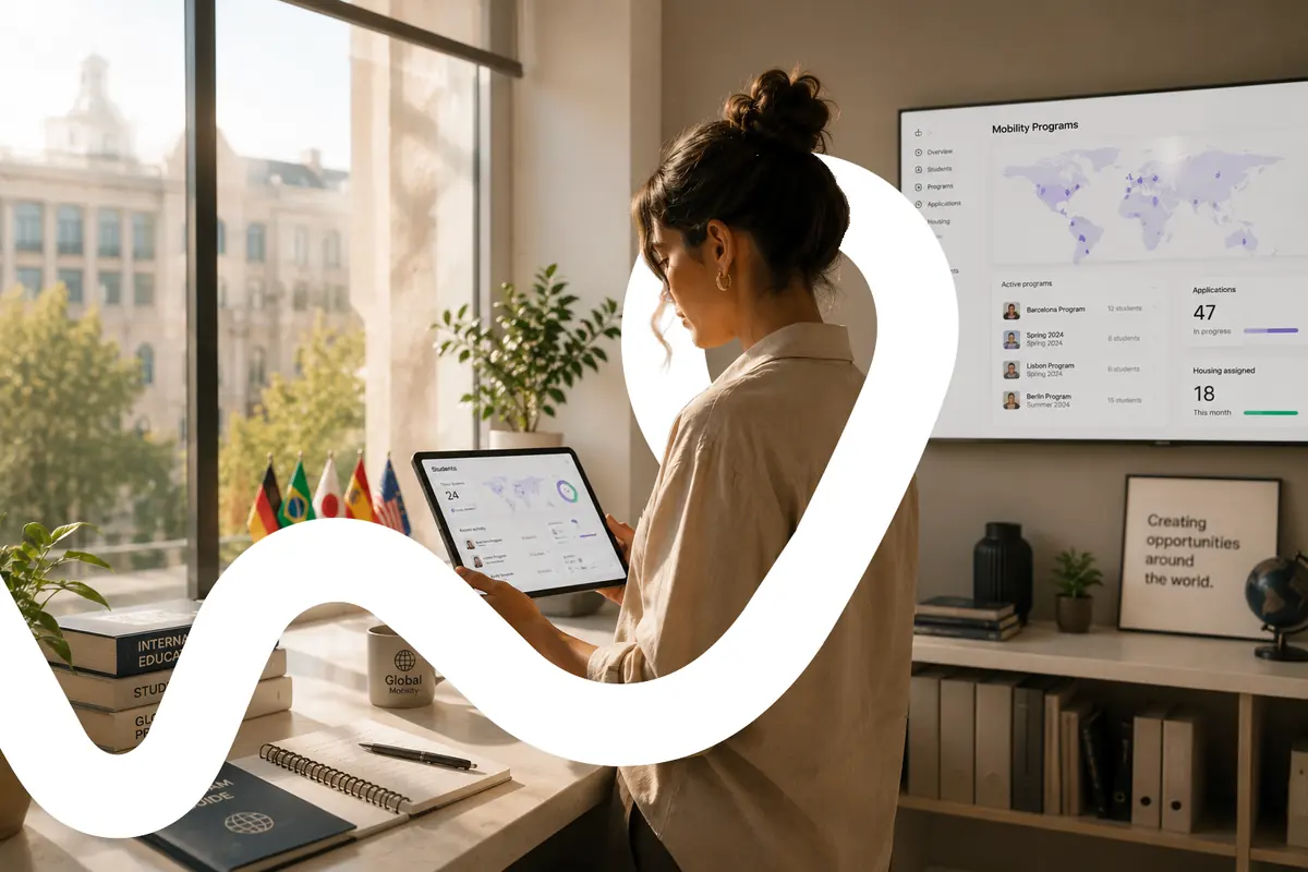 Relocatee managing a global mobility dashboard from a bright apartment